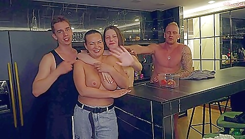 Slutty brunette gets fucked by two dudes in the theater