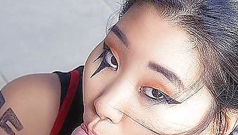 Sexy asian babe in white panties with a white mask