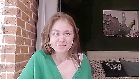 Skinny brunette with small tits is fingered in close up