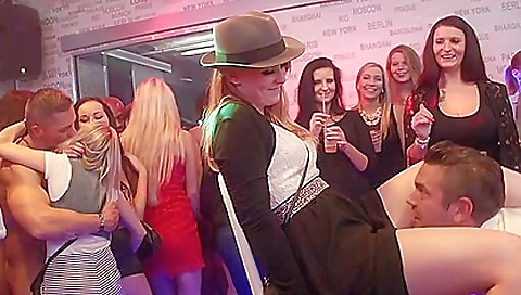 Busty brunette gets her pussy fucked in a group sex party