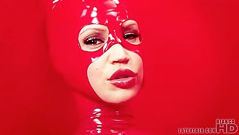 Redhead milf is relaxing on bed and playing with hair