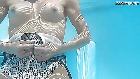 Sexy brunette shows off her body in a nude solo video