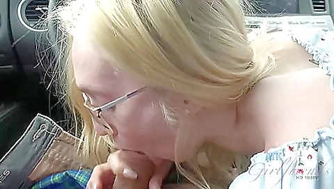 Blonde is in the car and she is taking the man's cock in mouth
