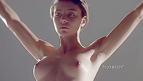 Redhead in lingerie spreads her legs and touches her pussy