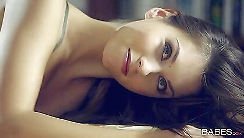 Sexy brunette with small tits and sexy face enjoys solo dancing